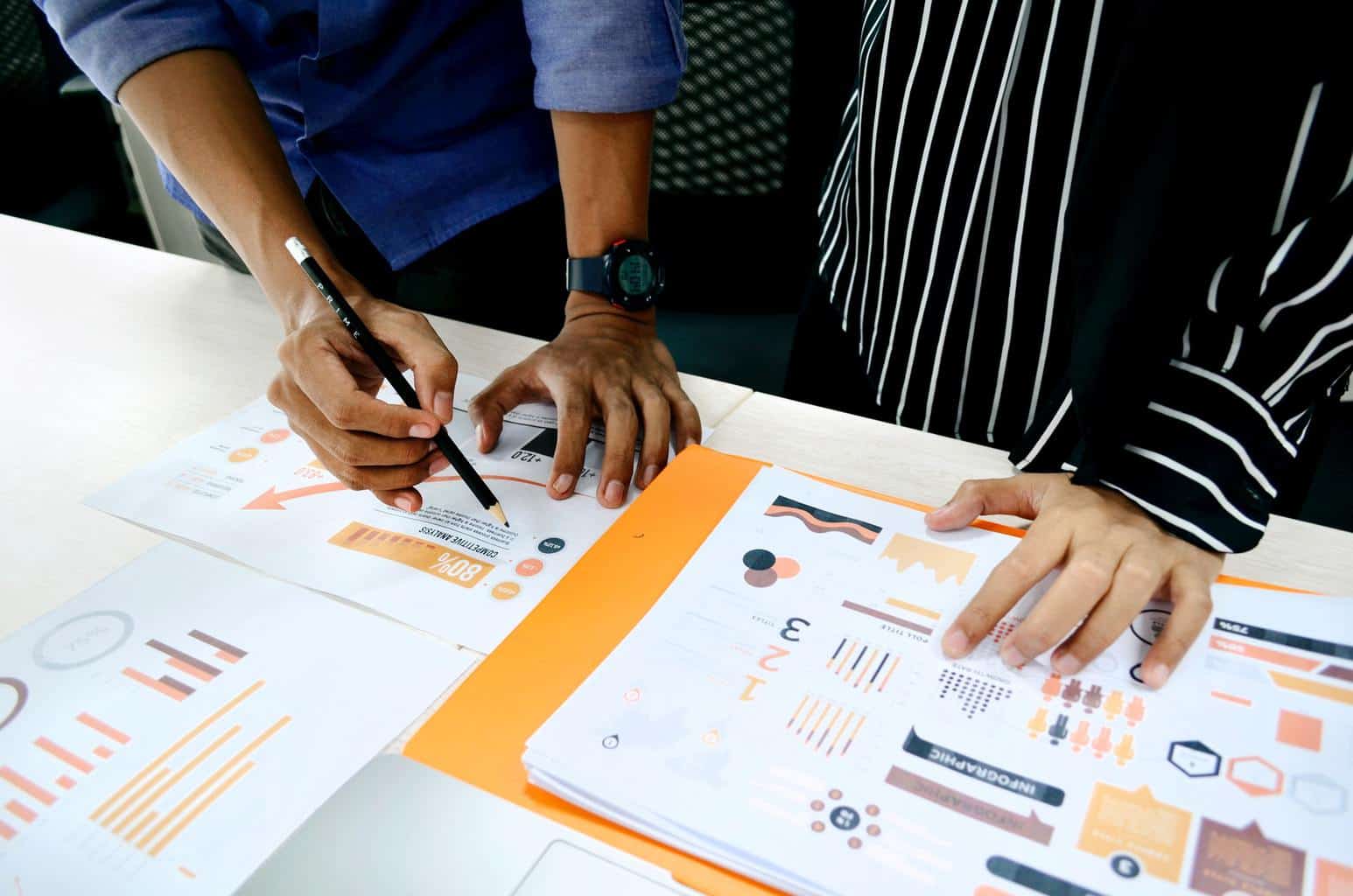 Man looking at graph