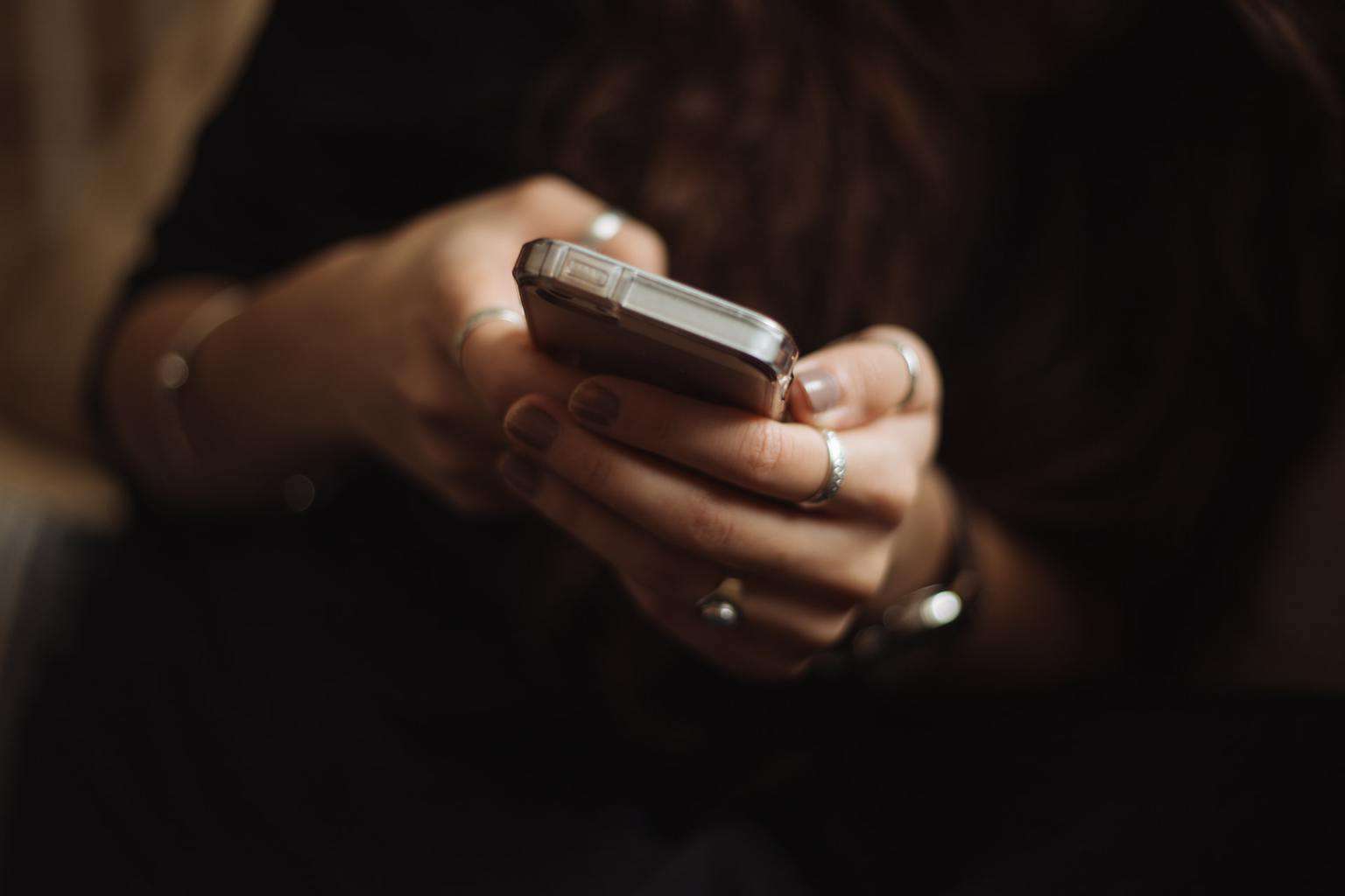 Person browsing on phone