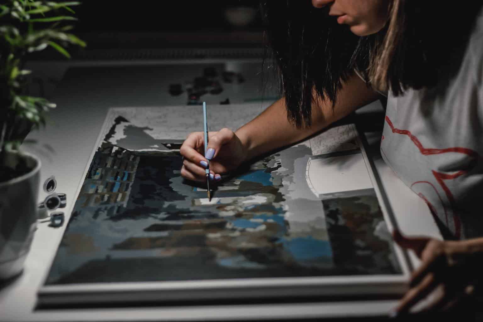 Young woman painting